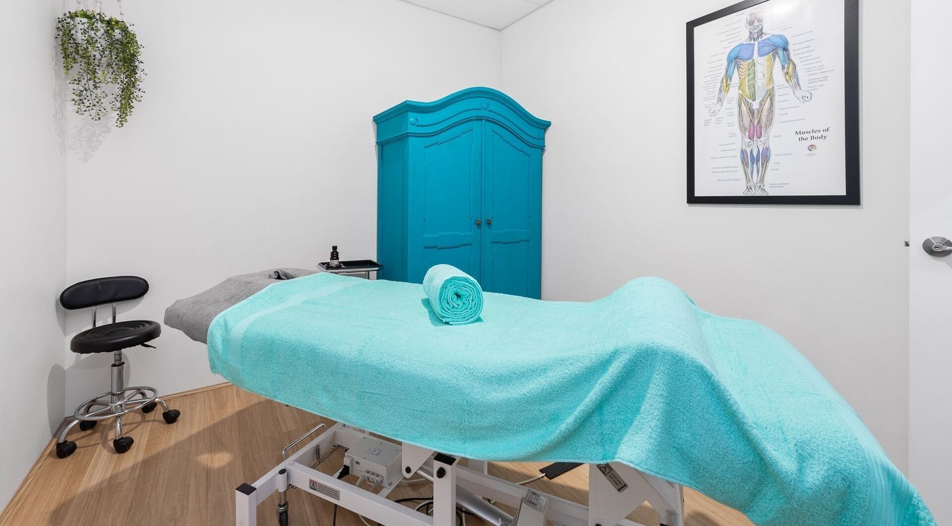 Therapy room at Bodyspace Recovery Studio, Jandakot, Western Australia, AU featuring a turquoise treatment table.