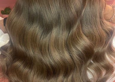 Elegant wavy hair styled at JessicaLibbyHair, Hinckley, England, GB.