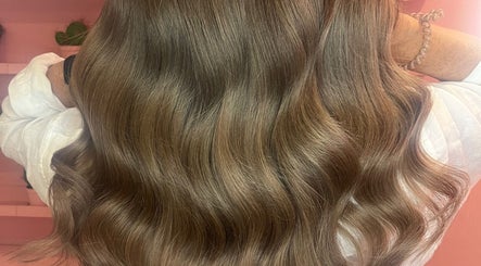 Elegant wavy hair styled at JessicaLibbyHair, Hinckley, England, GB.