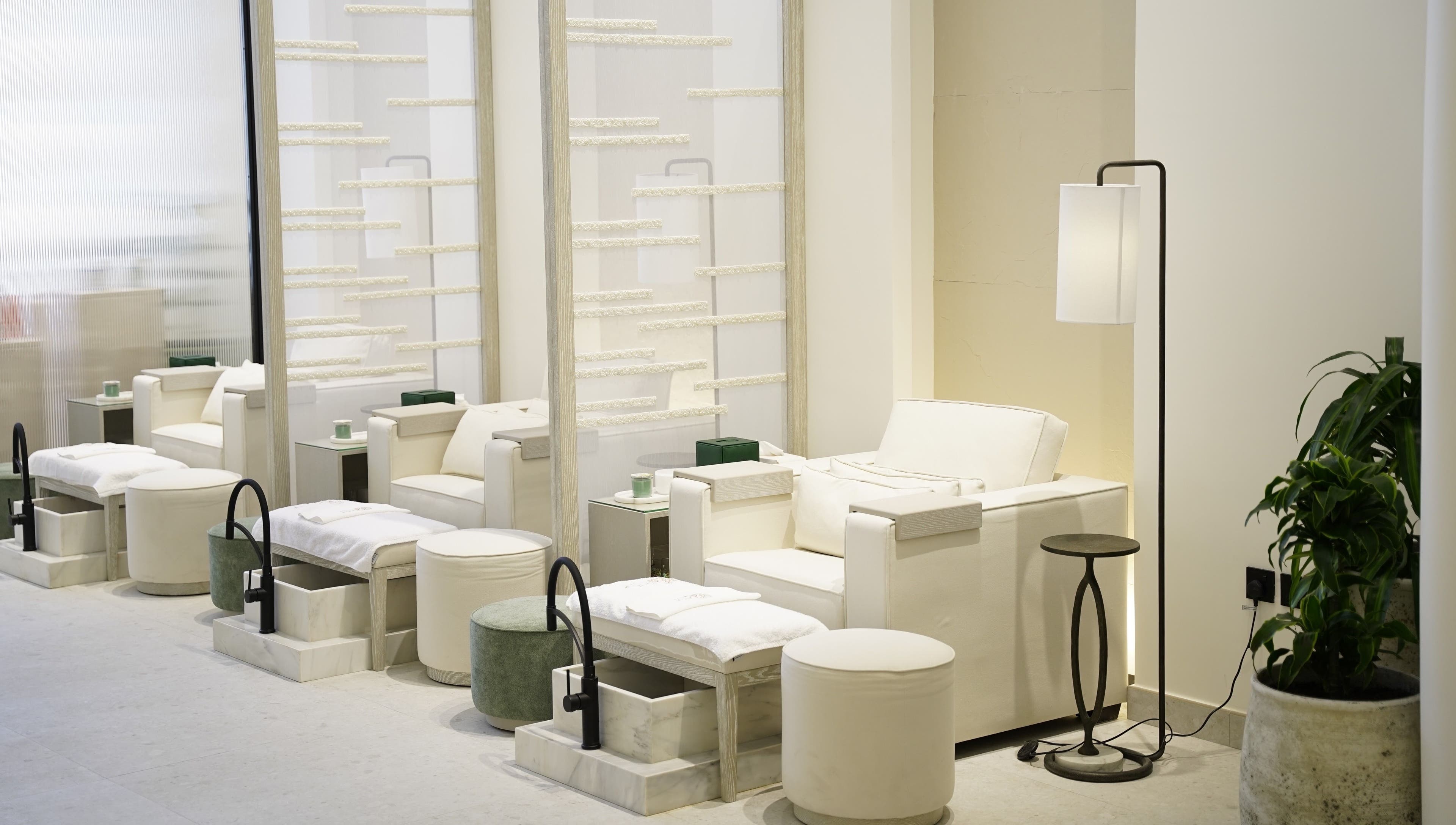 Serene pedicure lounge at Philautia Salon in Riyadh, Riyadh Province, SA, showcasing elegant, plush seating.
