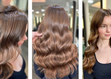 Elegant hair extensions at Aura Extensions, Twickenham, England, GB reveal shiny, smooth waves.