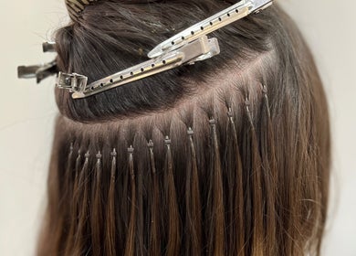Close-up of hair extensions at Aura Extensions, Twickenham, England, GB.