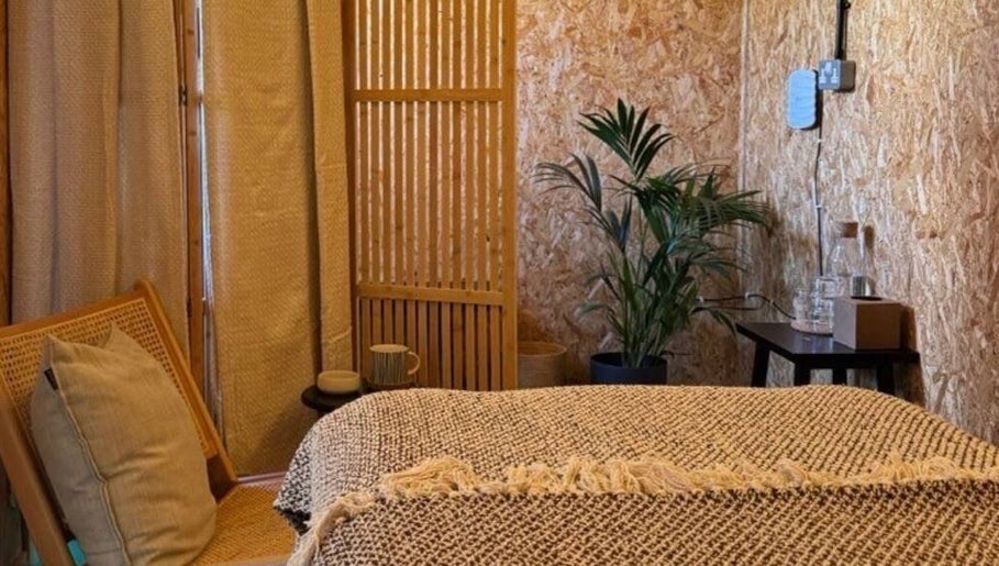 Cozy massage room at Massage Margate, Margate, GB with a comfortable chair and ambient decor.