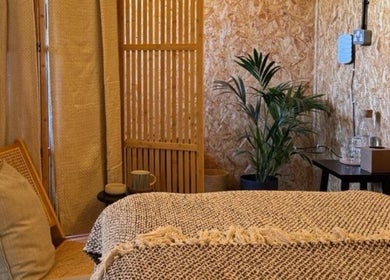 Cozy massage room at Massage Margate, Margate, GB with a comfortable chair and ambient decor.