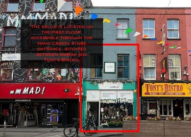 INK Beauty entrance between mmmad and Tony's Bistro on colorful street in Cork, County Cork, IE.