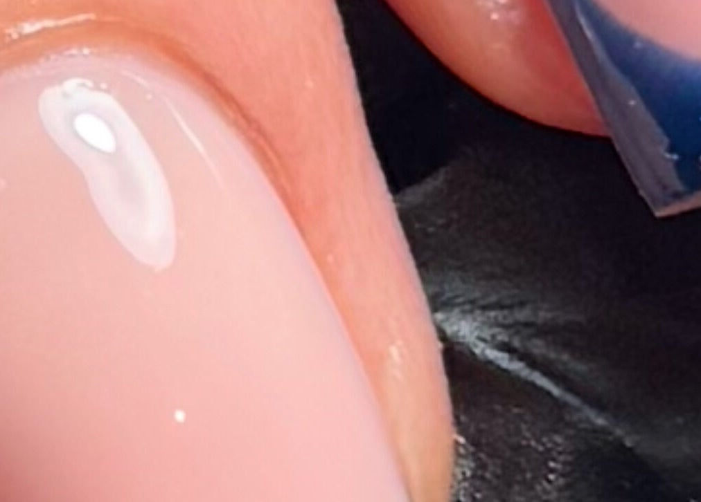 Close-up of a glossy nail manicure at ByChloeAllen, Tamworth, England, GB.