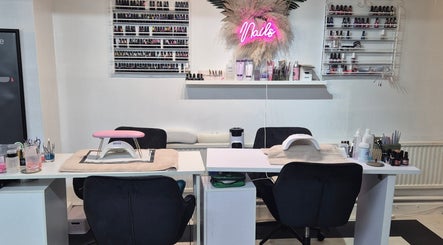 Nail care station at The Beauty Retreat, Eastbourne, England, GB, featuring vibrant polish displays.