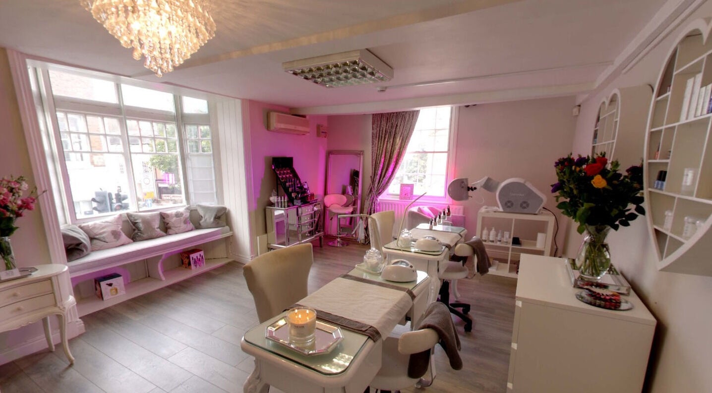Sophisticated interior of Secrets Boutique Salon in Daventry, England, GB with elegant decor and cozy seating.