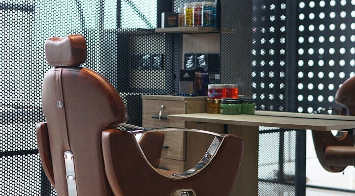 Elegant grooming chair at The Original Groomers, Dhaka, Dhaka Division, BD, offering premium wellness services.