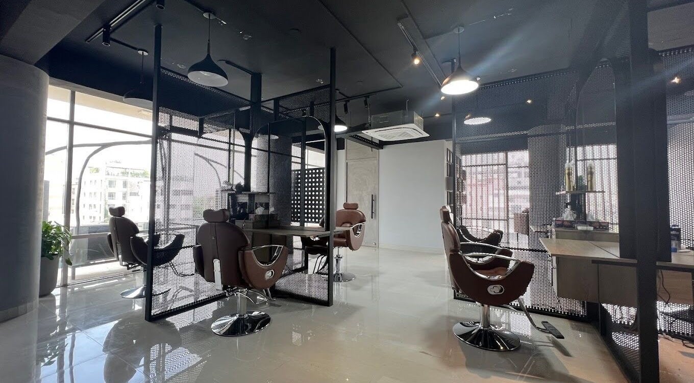 Sleek interior of The Original Groomers in Dhaka, Dhaka Division, BD with stylish barber chairs and modern decor.