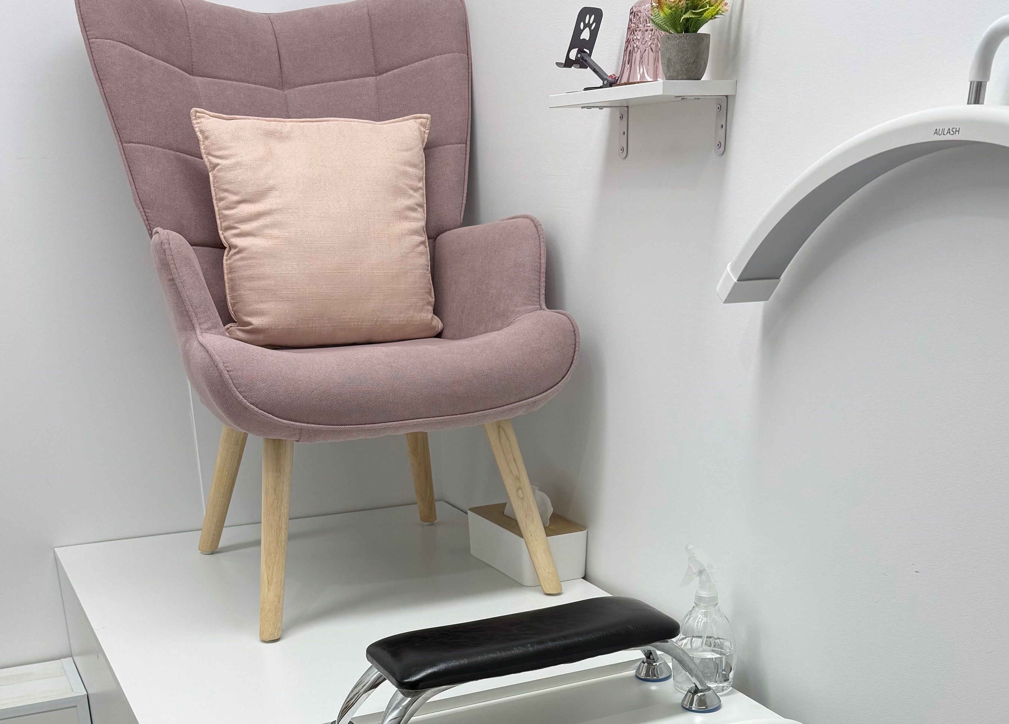 Inviting pedicure chair at Studio Monarch by Leia Ebert, Bundall, Queensland, AU, with soft pink tones.