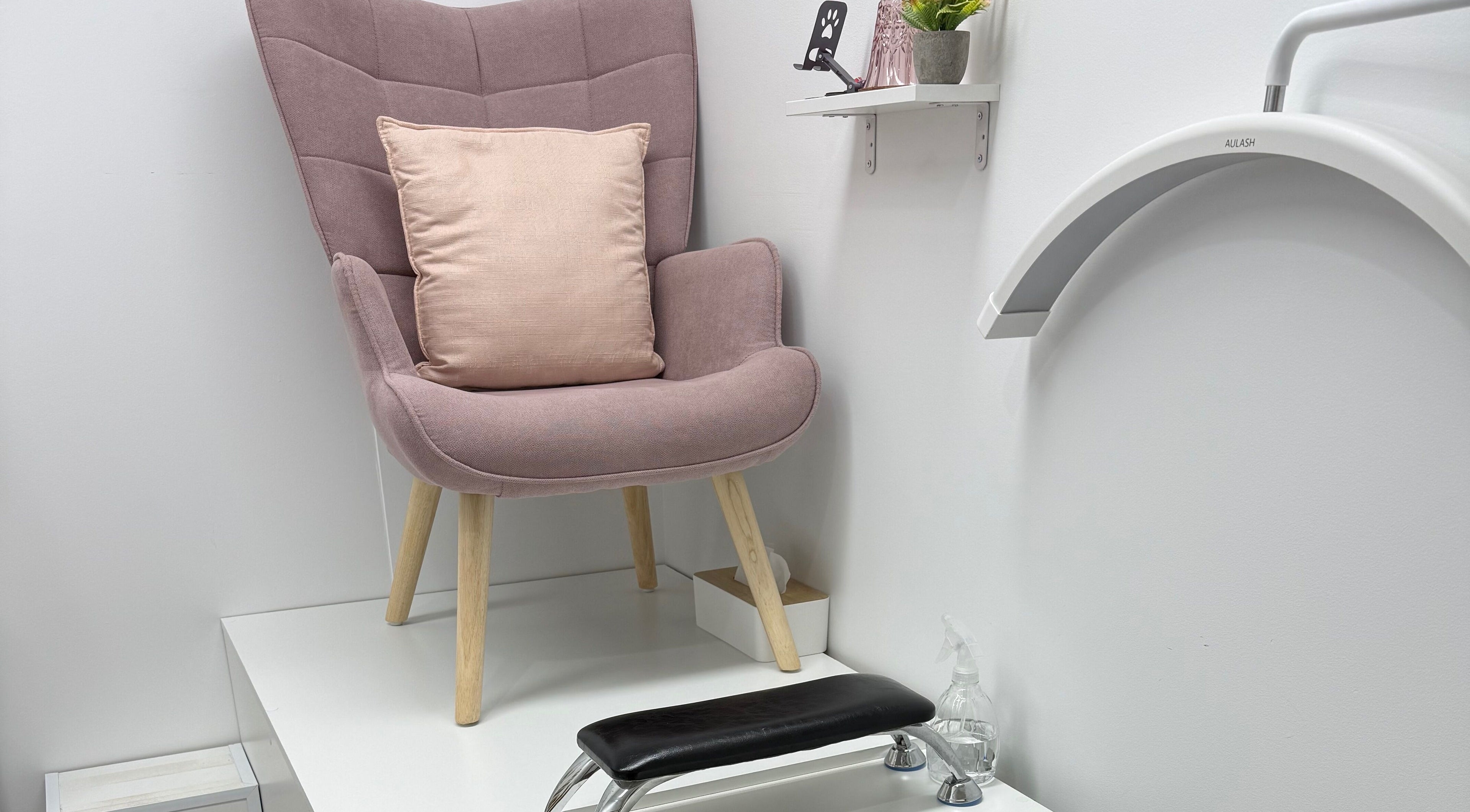 Inviting pedicure chair at Studio Monarch by Leia Ebert, Bundall, Queensland, AU, with soft pink tones.