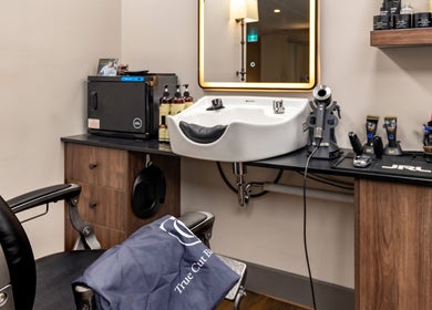 Interior of True Cut Barber Studio with modern styling tools in Sydney, New South Wales, AU.