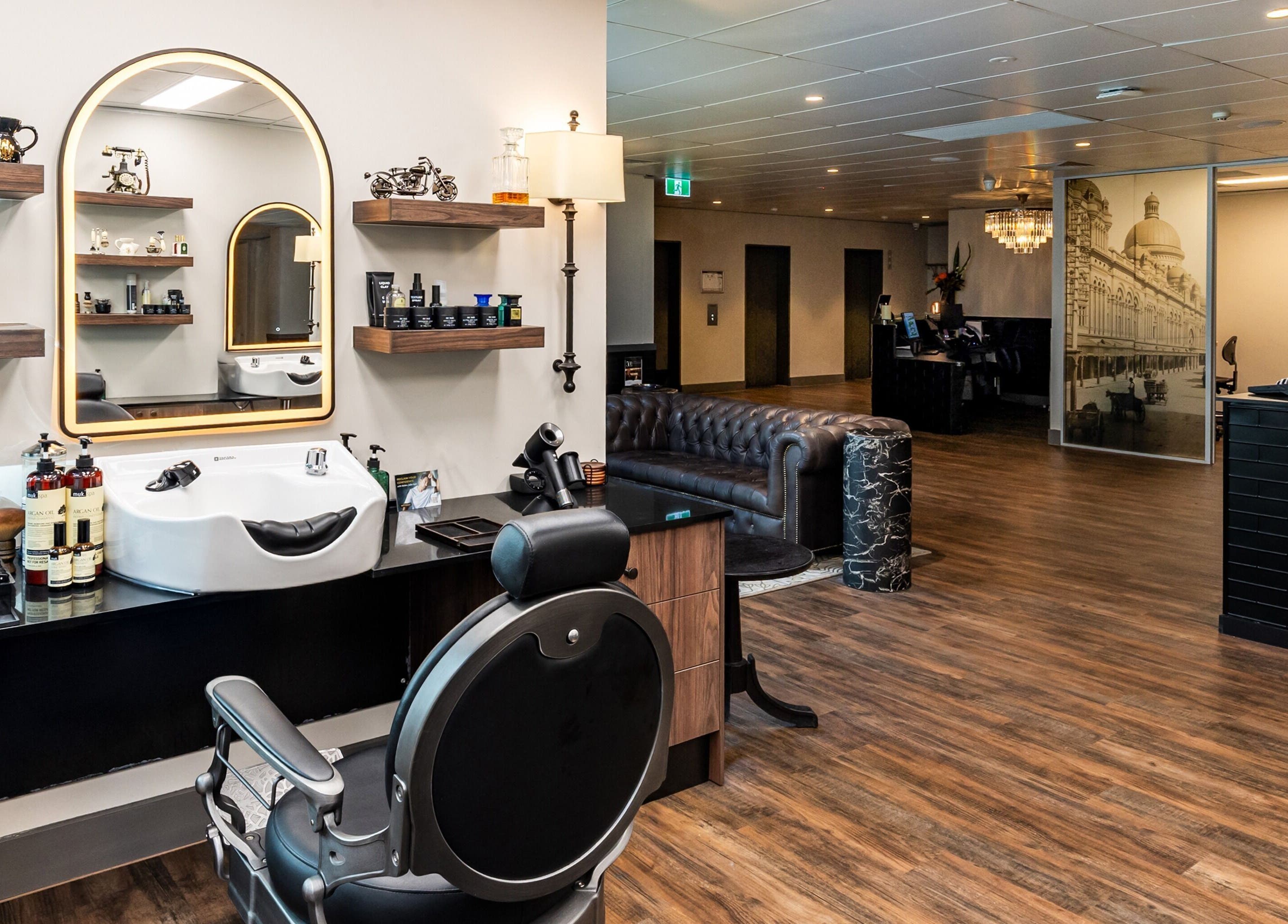 Chic interior of True Cut Barber Studio in Sydney, New South Wales, AU showcasing a stylish barber chair and decor.