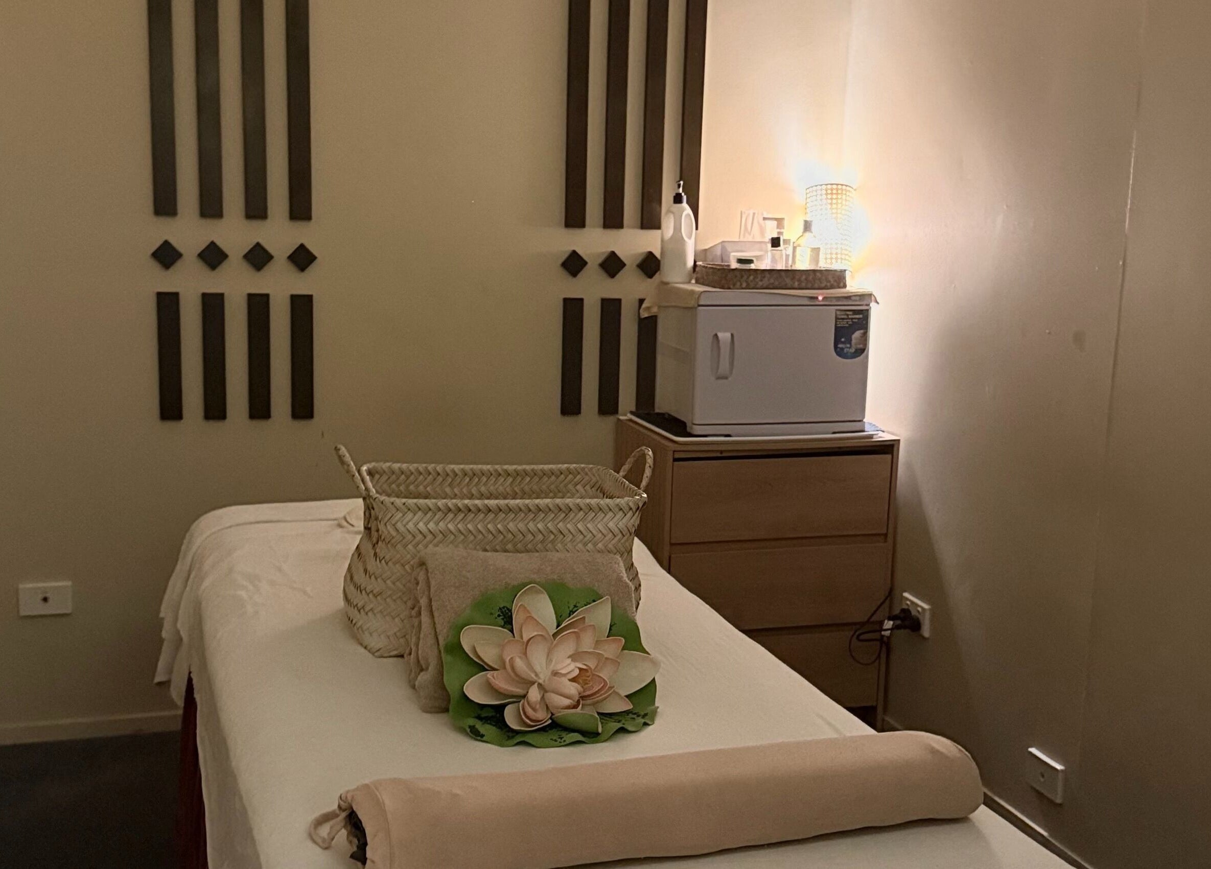 Tranquil massage room at Ploythai Massage and Spa in Wynnum, Queensland, AU, featuring calming decor.