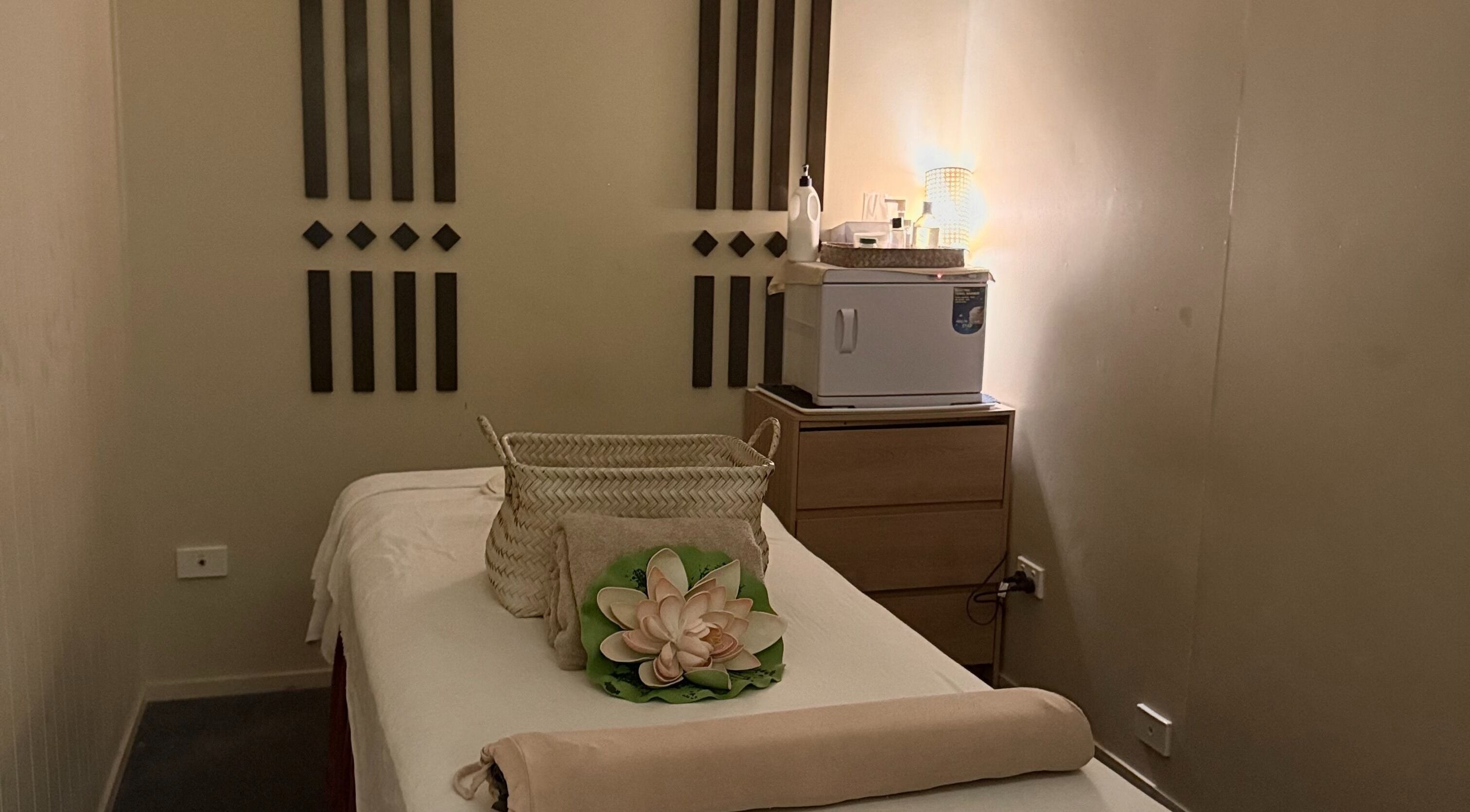 Tranquil massage room at Ploythai Massage and Spa in Wynnum, Queensland, AU, featuring calming decor.