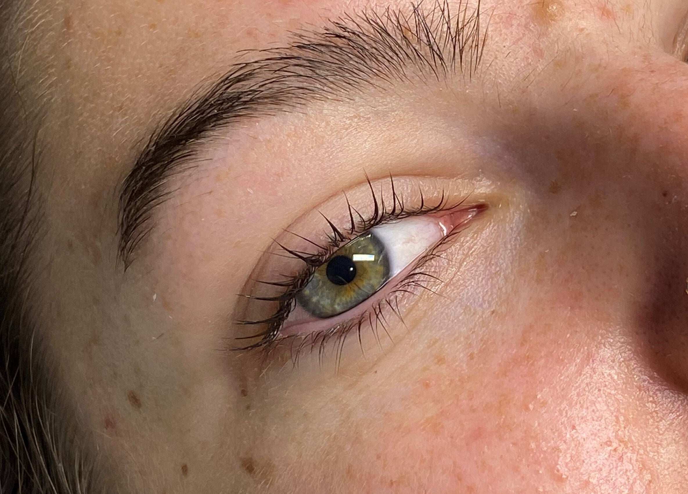 Close-up of a well-groomed eyebrow and natural lashes at B Studio, Erskine, Western Australia, AU.
