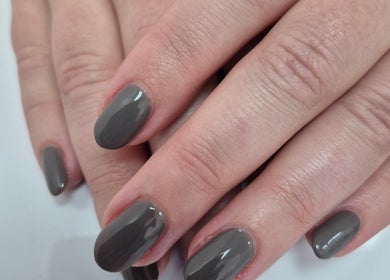 Elegant gray manicure at Ju'sbeauty in Newcastle upon Tyne, England, GB. Perfectly polished nails.