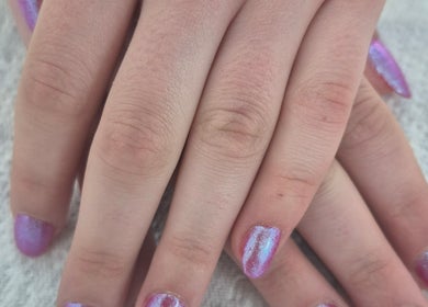 Iridescent manicure at Ju'sbeauty, Newcastle upon Tyne, England, GB. Perfectly painted nails on a soft background.