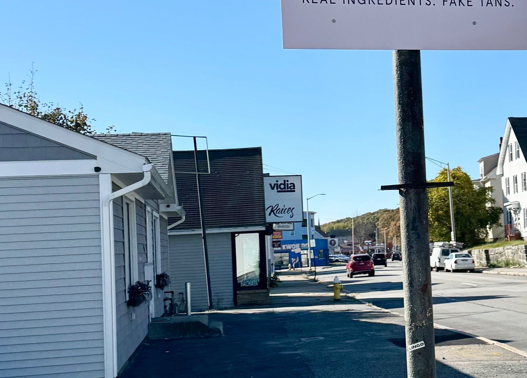 Street view near BlushTan Worcester in Worcester, Massachusetts, showcasing local business signage.