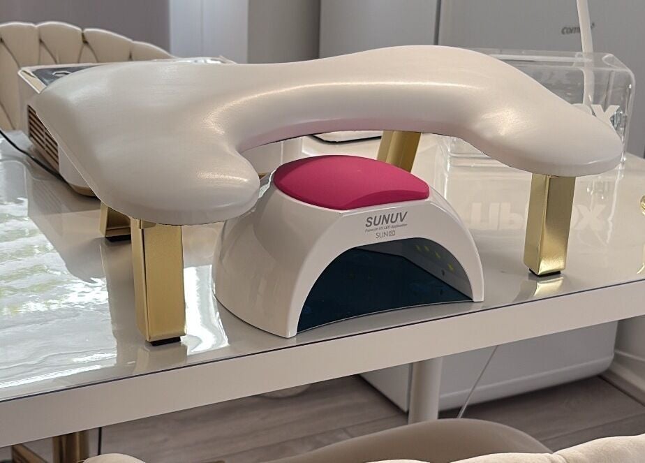 UV nail station with elegant chairs at BeautyGaze, London, England, GB, for premium manicure services.