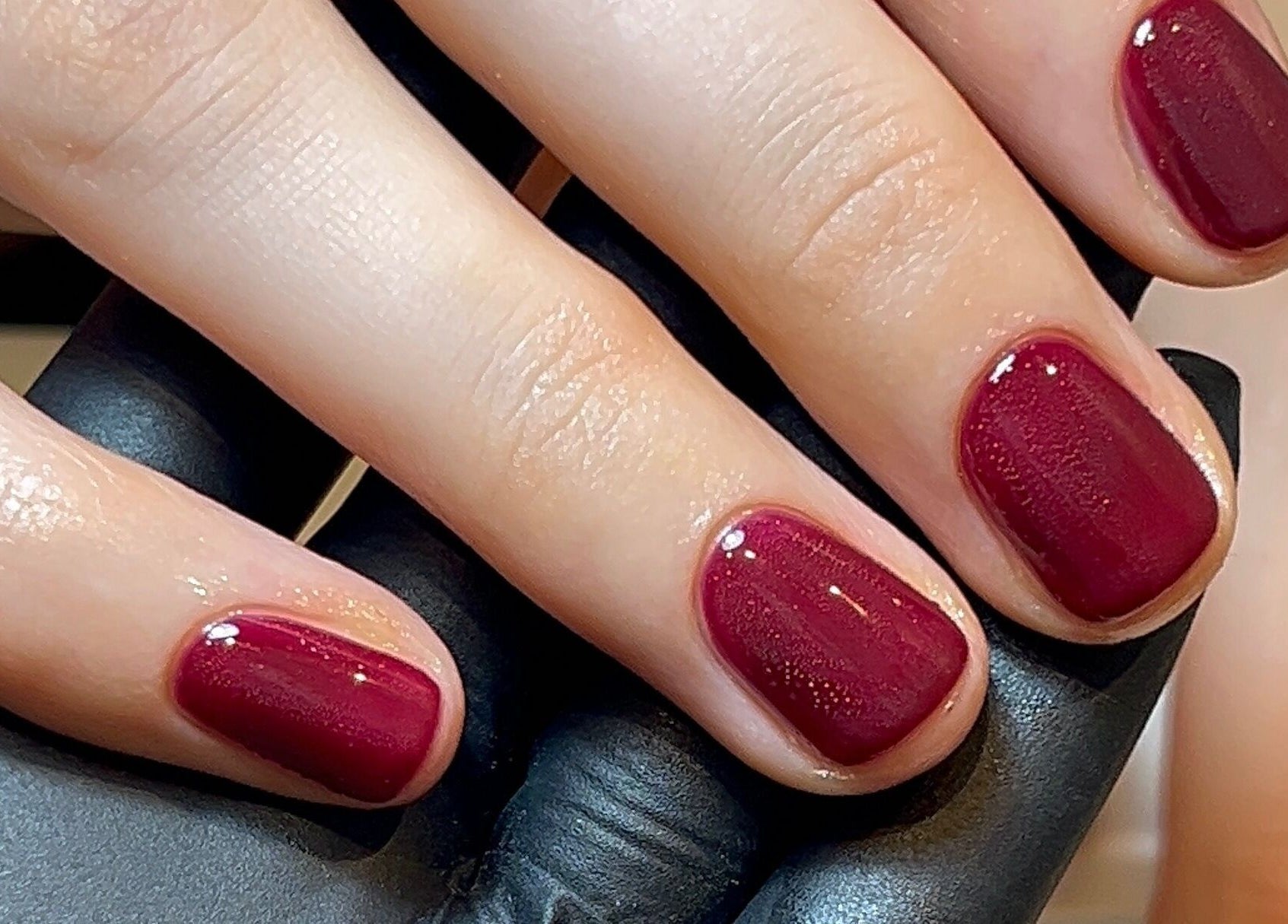Elegant burgundy manicure at By Emily Francesca - Bristol, Bristol, England, GB. Perfectly shaped short nails.