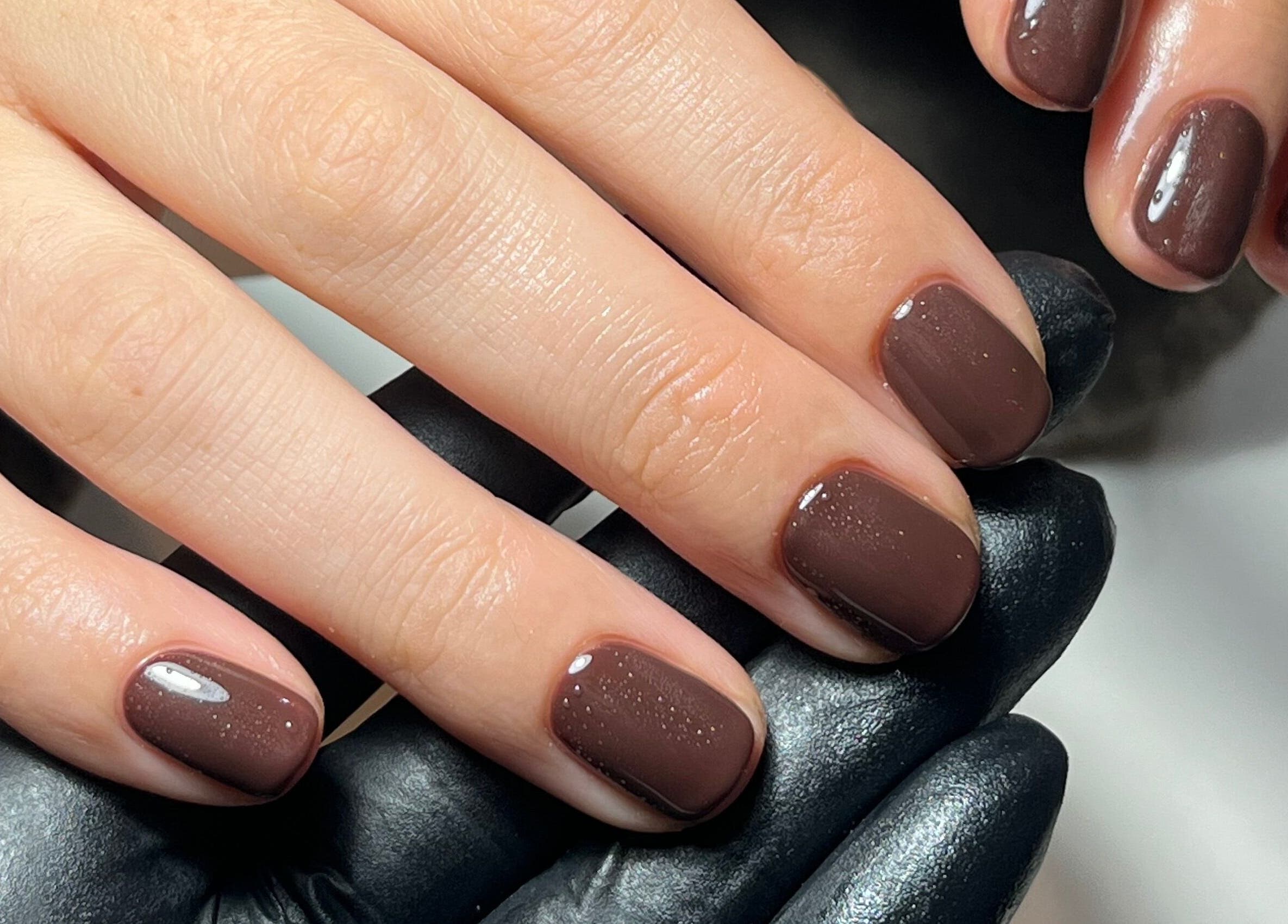 Stylish brown manicure at By Emily Francesca - Bristol, located in Bristol, England, GB.