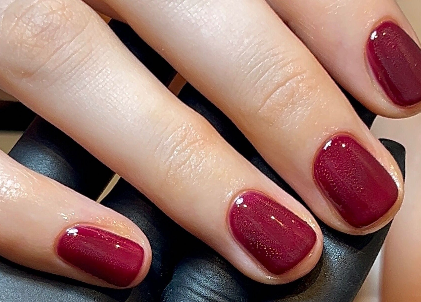 Elegant crimson manicured nails by Emily Francesca - Langford in Langford, England, GB. Perfect for beauty enthusiasts.