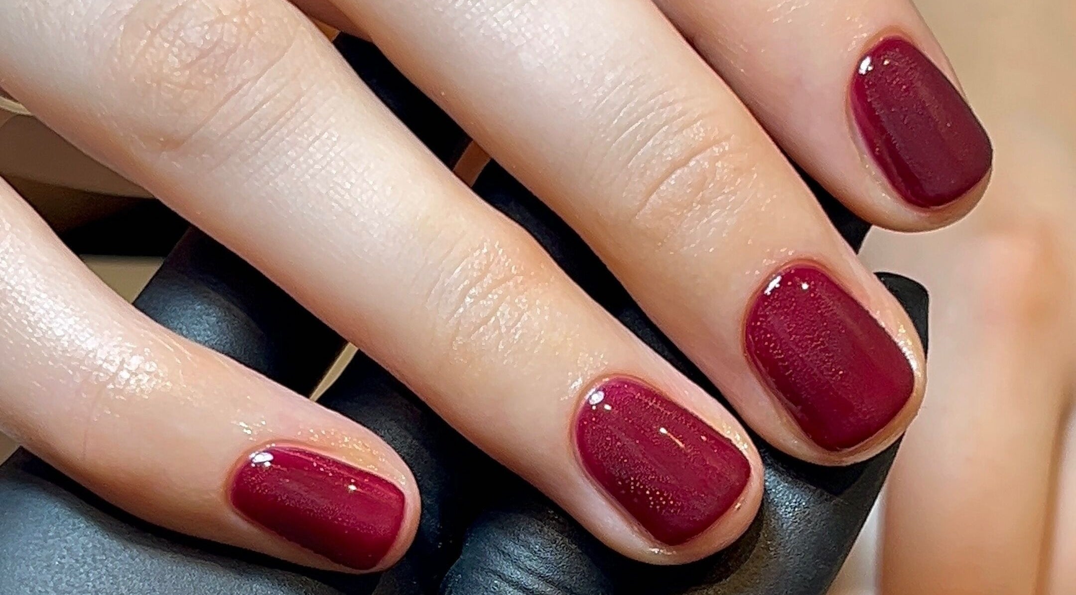 Elegant crimson manicured nails by Emily Francesca - Langford in Langford, England, GB. Perfect for beauty enthusiasts.