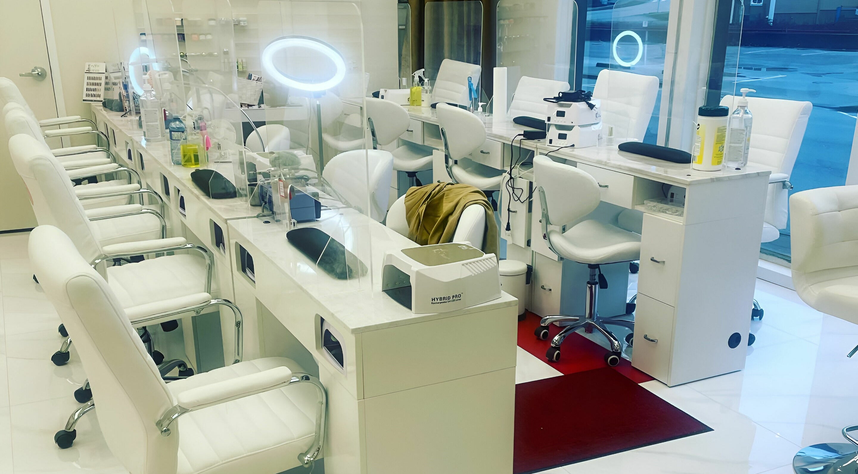 Interior of Champagne Nail Lounge Abbotsford showcasing modern manicure stations in Abbotsford, British Columbia, CA.