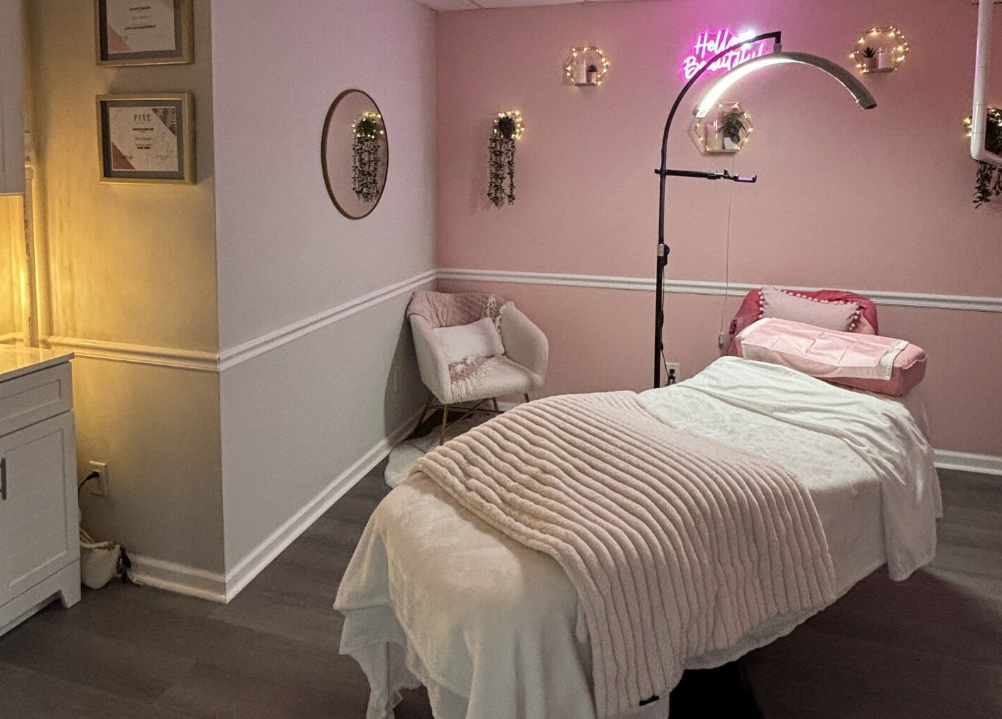 Calming treatment room at My Pretty Face Studio, Vero Beach, Florida, US with plush bedding and soft lighting.