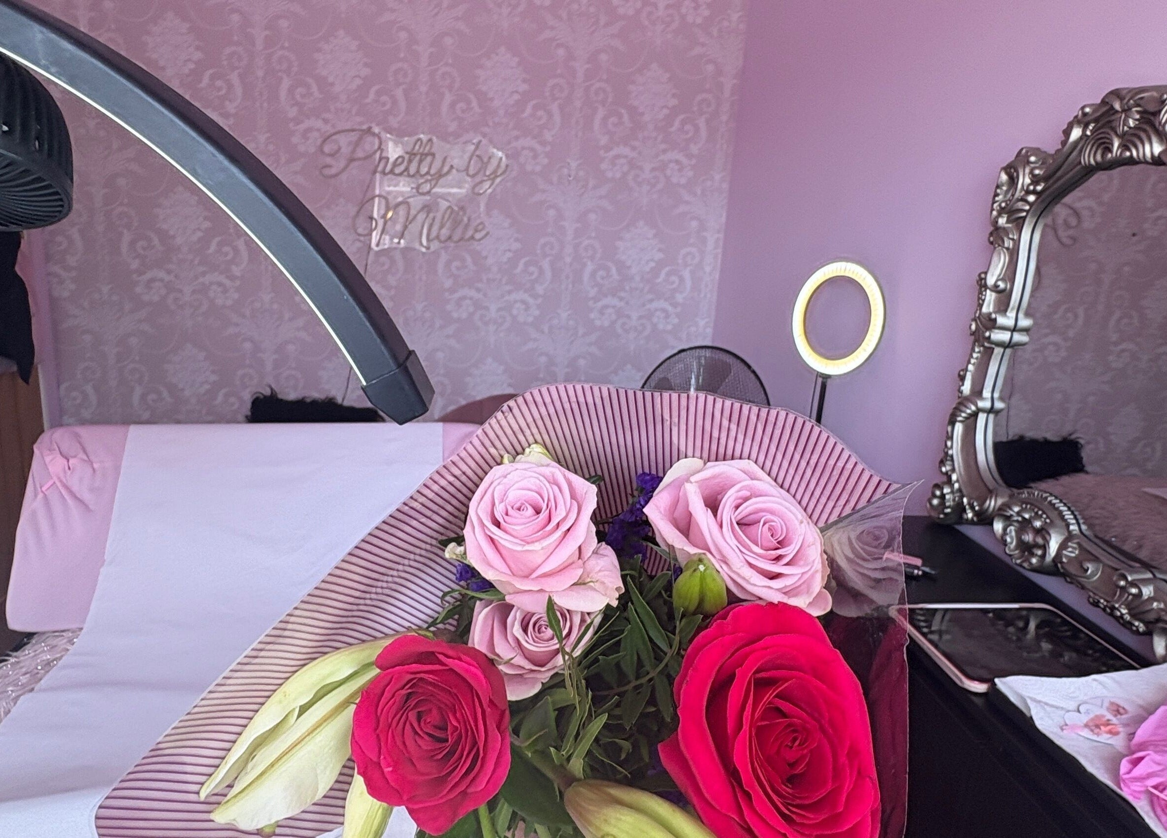 Chic floral bouquet at Pretty by Millie, Bewdley, England, GB with elegant mirror backdrop.