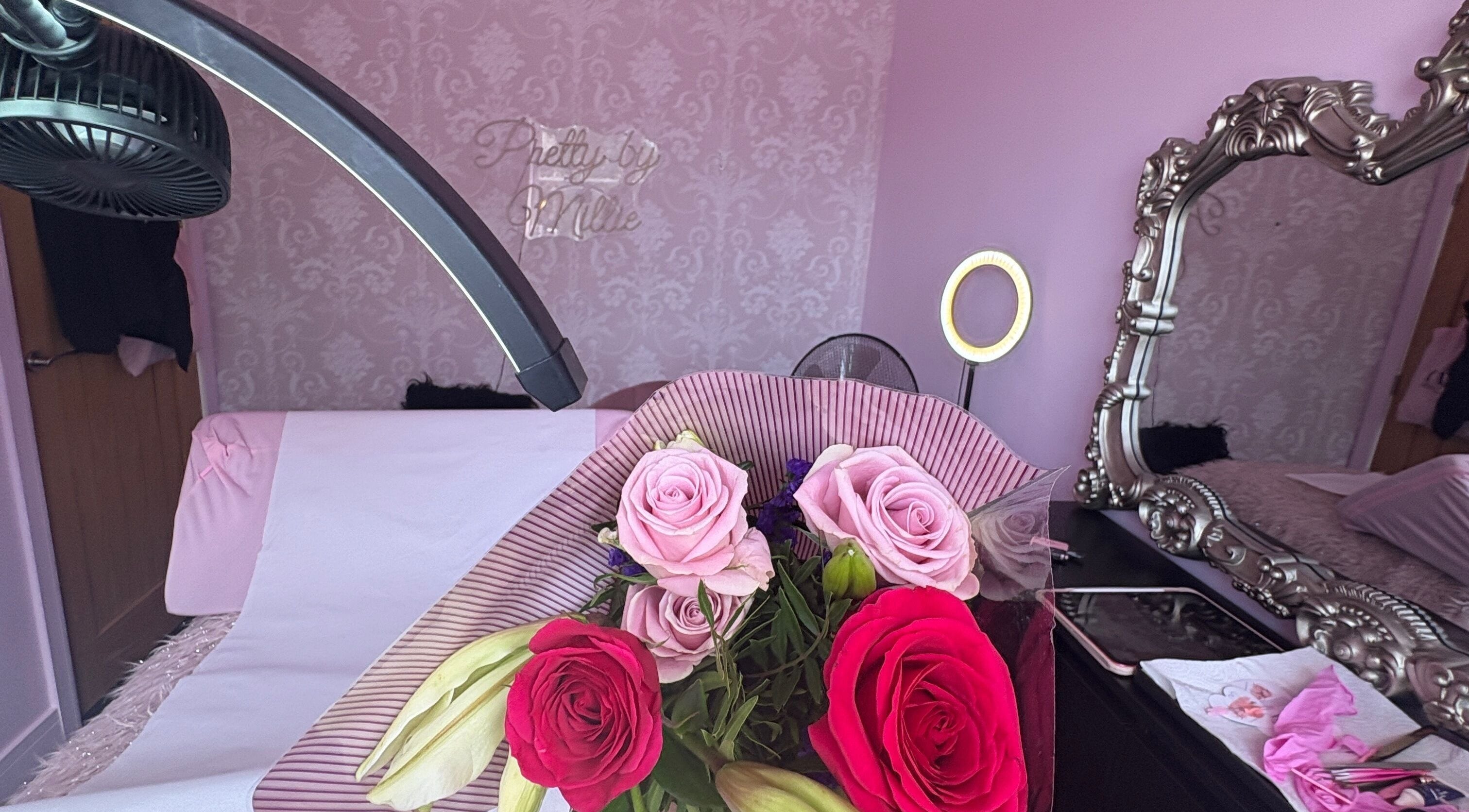 Chic floral bouquet at Pretty by Millie, Bewdley, England, GB with elegant mirror backdrop.