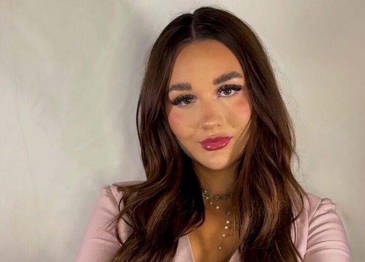 Beauty expert at Pretty by Millie, Bewdley, England, GB, showcasing radiant makeup and styling.