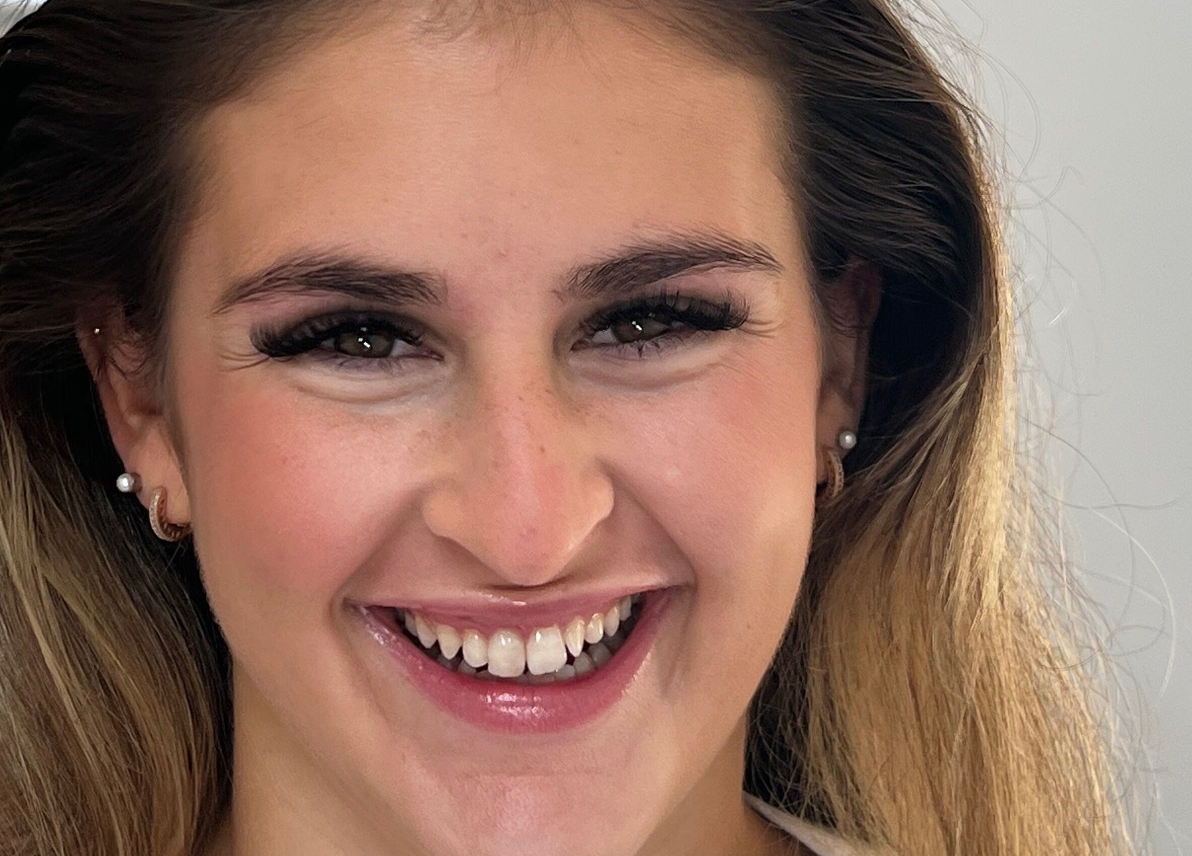 Smiling client with flawless makeup at Pretty by Millie, Bewdley, England, GB.