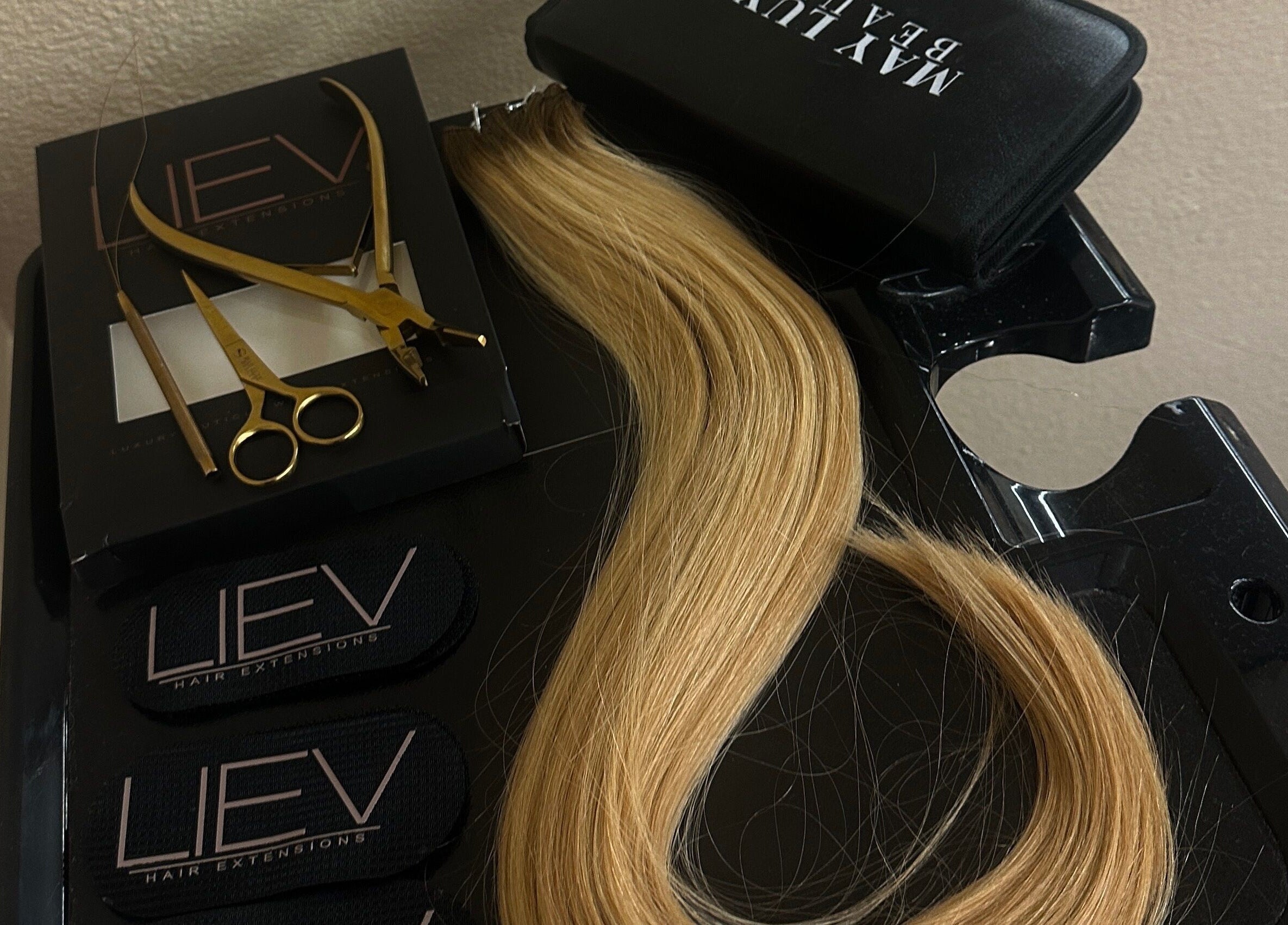Hair extensions and styling tools at Liev Salon, Tulare, California, US.