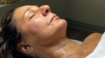 Relaxed woman receiving a facial at Balanced Beauty Med Spa, Vaughan, Ontario, CA.