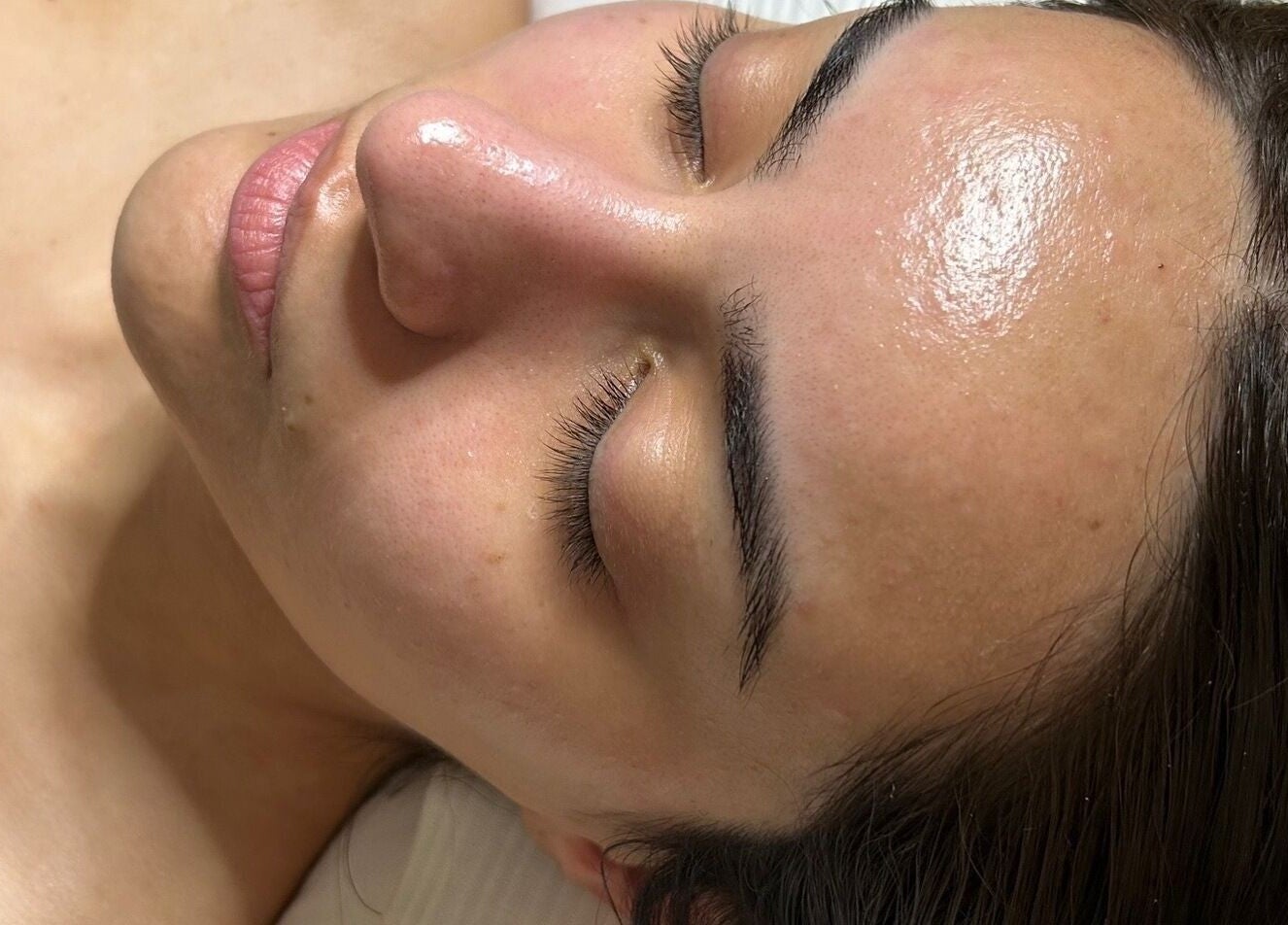 Woman enjoying a facial treatment at Balanced Beauty Med Spa in Vaughan, Ontario, CA.