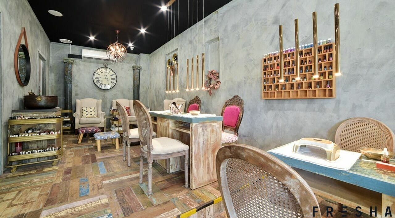 Rustic chic interior of TEN The Emmaculate Nails, Kellyville, NSW, AU showcasing vintage decor and nail stations.