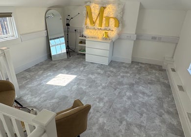 Elegant interior at Holly Jayne Hair, Derby, England, GB, with modern decor and natural light.