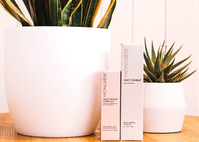 Monuskin skincare beside plants at Sacred Roots Limited, Guernsey, Vale, GG.