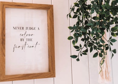 Framed quote and hanging plant at Sacred Roots Limited, Guernsey, Vale, GG enhancing serene ambiance.