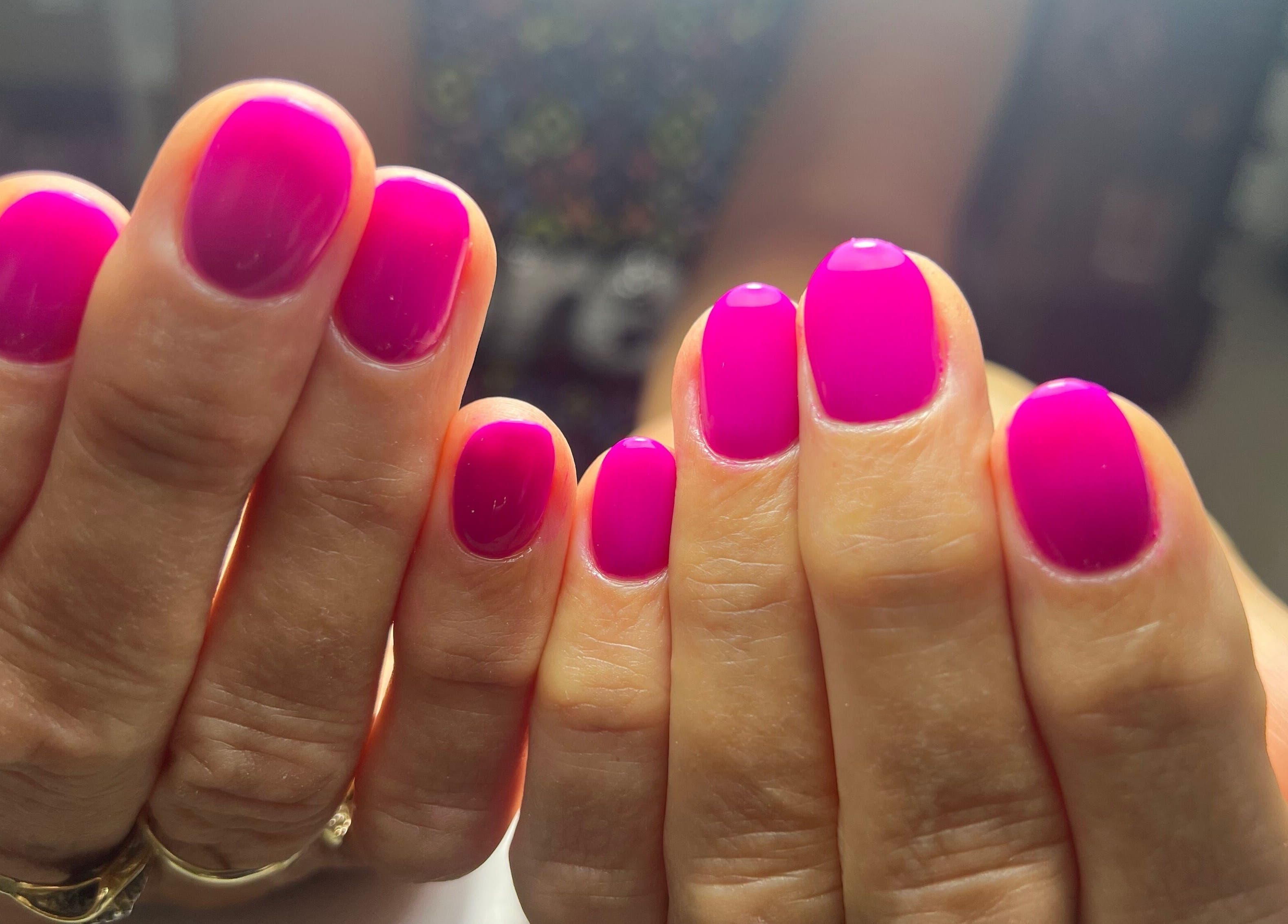 Vibrant pink manicure at Celini Beauty Salon, Limassol, Limassol, CY, showcasing expert nail care.