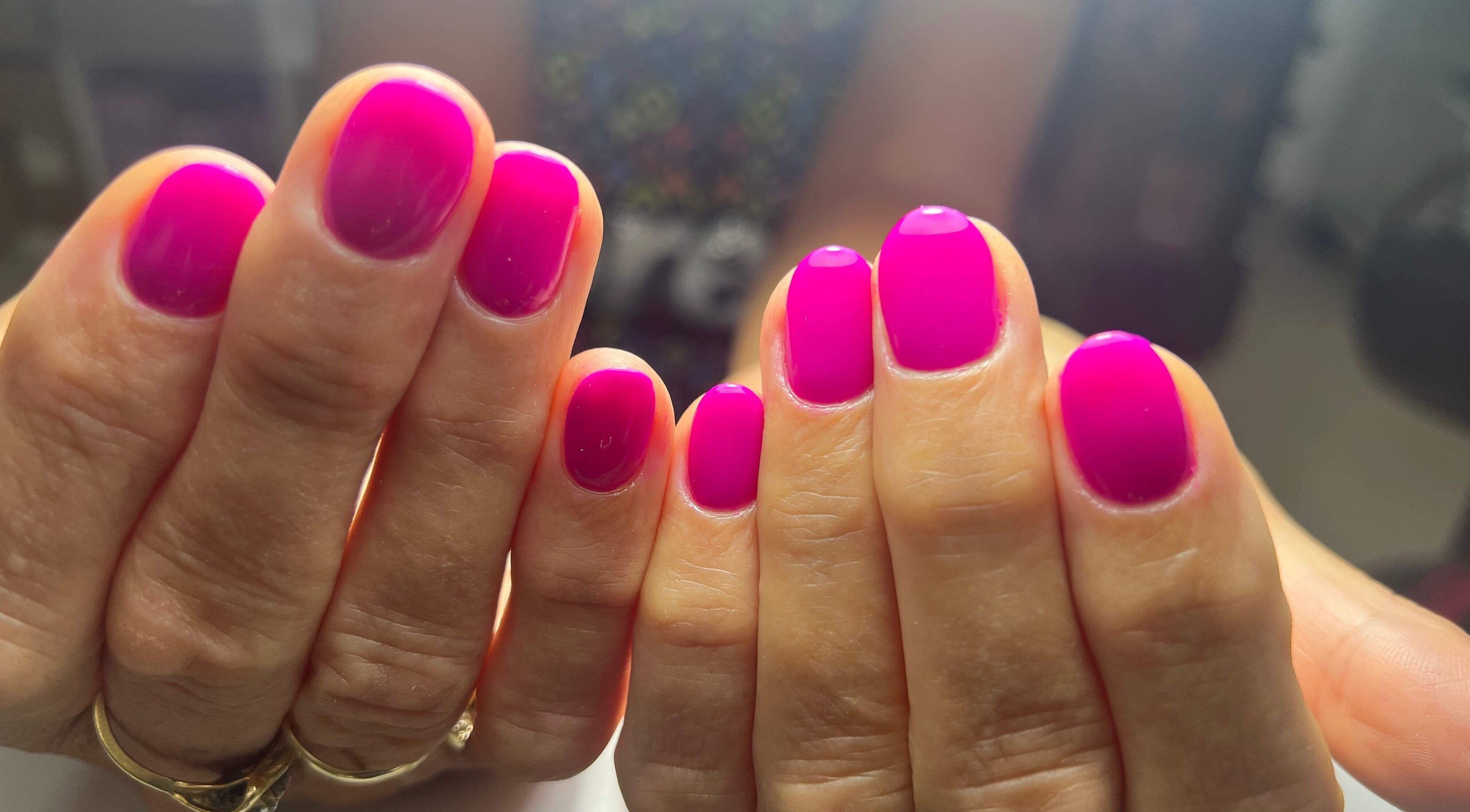 Vibrant pink manicure at Celini Beauty Salon, Limassol, Limassol, CY, showcasing expert nail care.