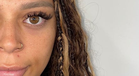 Close-up of eye with lush lashes at Fairy Lash Mother, Boise, Idaho, US, showcasing natural beauty.