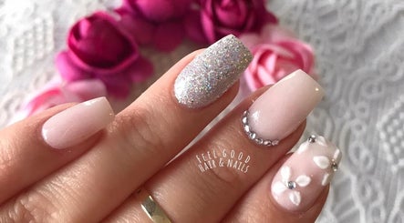Elegant nail art with glitter and floral designs at Feel Good Nails, Benoni, Gauteng, ZA.