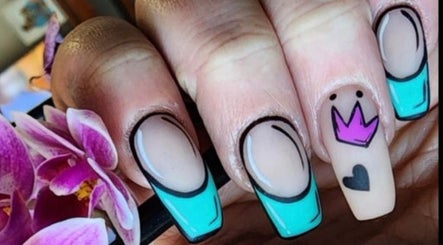 Vibrant blue and pink nail art at Feel Good Nails, Benoni, Gauteng, ZA, featuring floral accents.