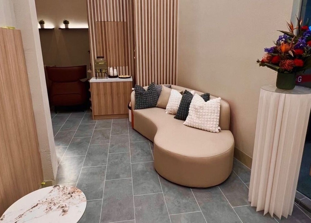 Elegant seating area in Healing Arts Essential Spa, Melbourne, Victoria, AU, featuring modern decor.