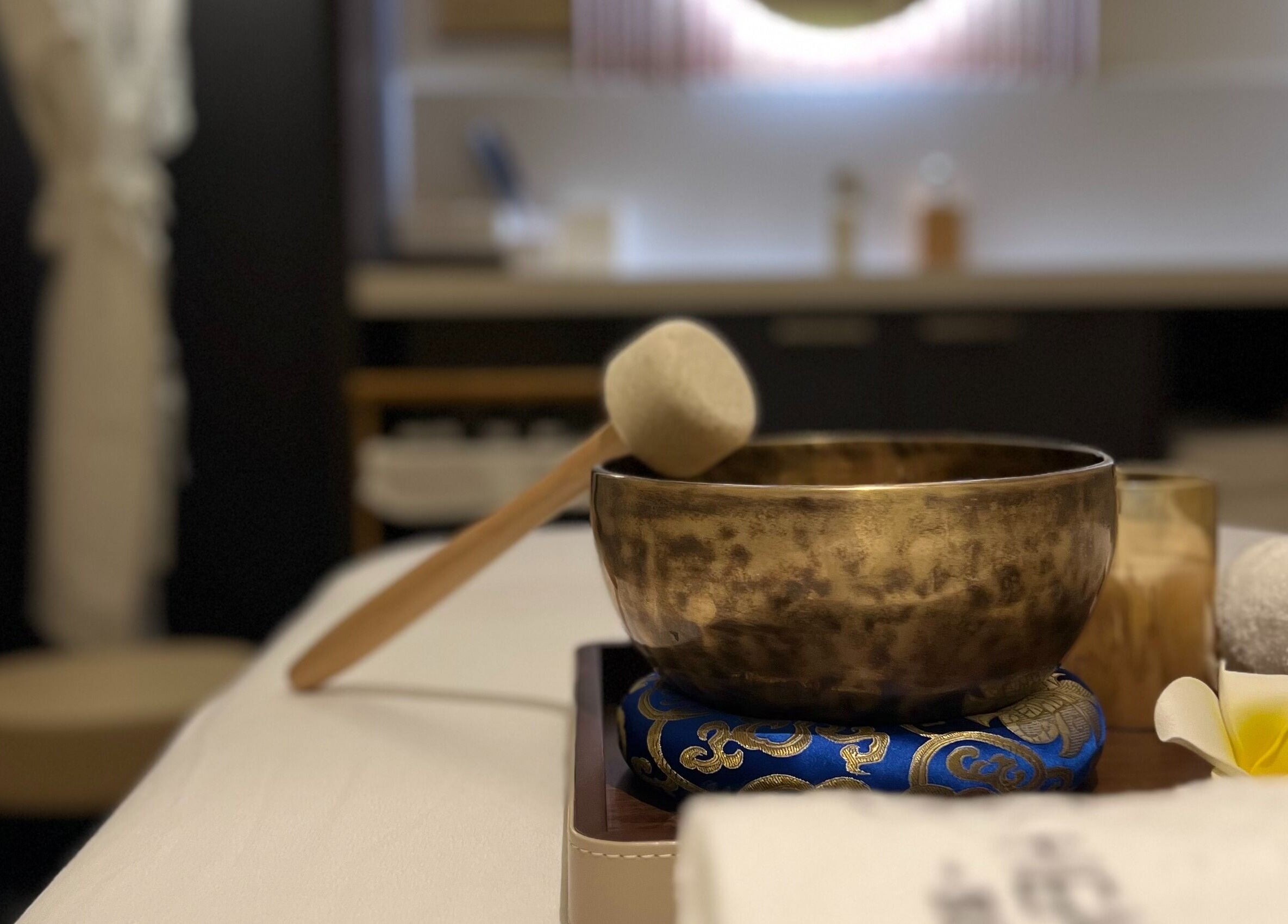 Singing bowl and flower arrangement at Healing Arts Essential Spa, Melbourne, Victoria, AU.