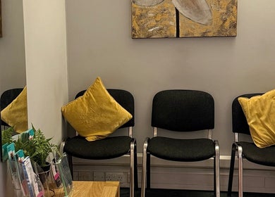 Inviting waiting area at V Fritz Lymphatic Drainage Specialist in London, GB with chairs and art.